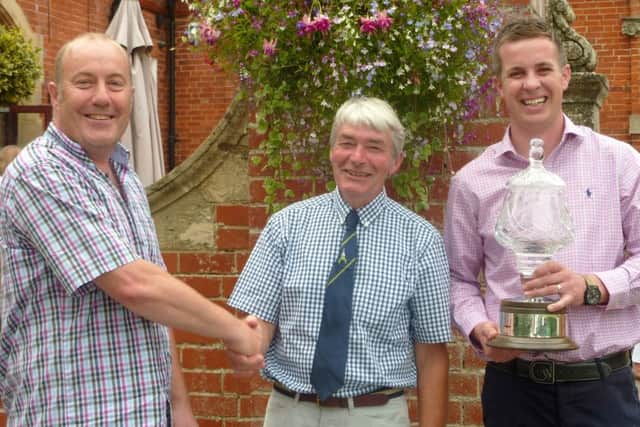 Captains Trophy winner John Stephenson (left) with mens captain Graham Sykes and director of golf Michael Langford (right EMN-160108-144331002