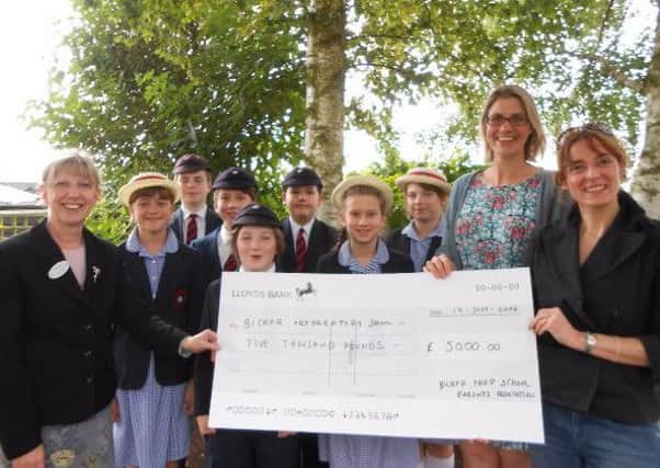 The cheque presentation to Bicker Preparatory School and Early Years following fundraising in the 2015/16 academic year. EMN-160729-113854001