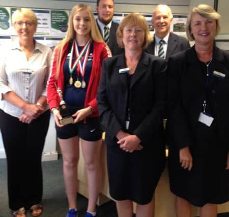 Rising athlete Amber Moss, pictured with staff members at The Nottingham in Louth.