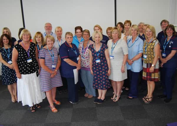 Some of the NHS staff who received their long service awards EMN-160308-103901001