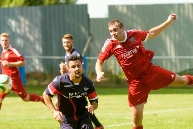 Action from Boston Town's FA Cup clash with Wisbech
