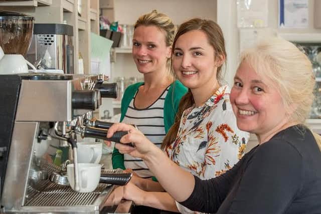 Owner Jane Reed with staff members Ellie Major and Theah Saberton EMN-160815-135942001