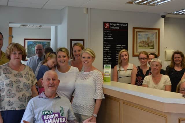 Andrew has braved the shave to raise funds for Macmillan.
