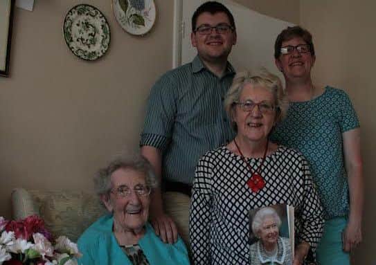 Doris Wallington with daughter Susan Waring and grandchildren Julia and James. EMN-160816-093938001