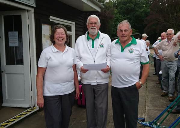 Jubilee Park club pairs competition winners Jean Wood and Frank Manley with Pete Brown (centre) who made the presentations.