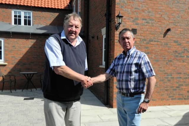 District Councillor Terry Knowles (pictured left) with Manby Airfield landowner, David Grantham.