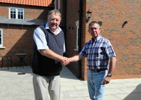 District Councillor Terry Knowles (pictured left) with Manby Airfield landowner, David Grantham.