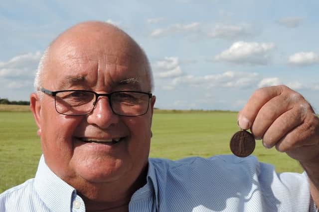 Basil Bruntlett with the medal