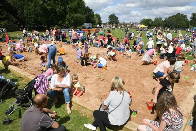 Beach in Central Park with Donkey Rides and children's activities. EMN-161008-145417001