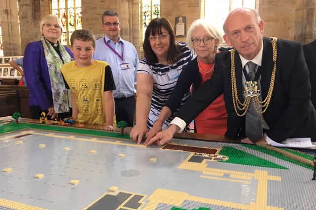 Laying the first bricks. Pictured, from left, The Rev Alsion Buxton, Charlie Pickwell, David Mason, assistant diocesan secretary, Tracey Scoot, church warden, Jill Hughes, High Sheriff of Lincolnshire, and Mayor of Boston Stephen Woodliffe.