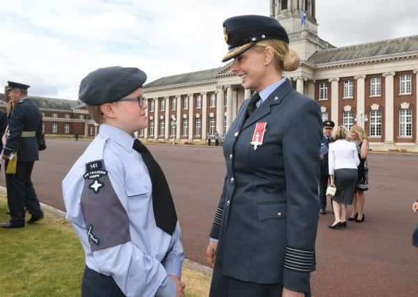 Cadet Ethan Gray, from Boston, with Honorary Group Captain Carol Vorderman at RAF College Cranwell. Photo: David Dawson