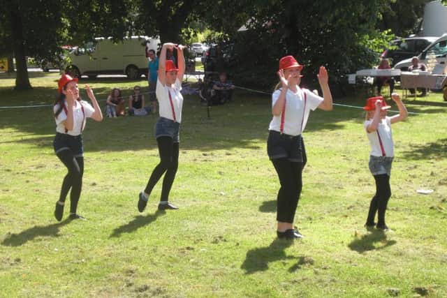 Zest Dance School perform for the crowds at Helpringham. EMN-160816-102358001