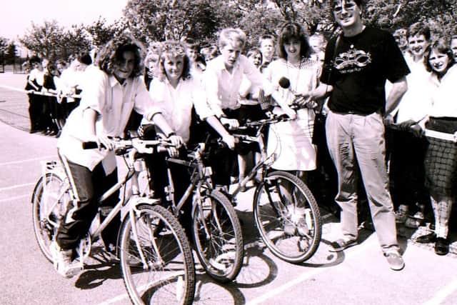 BBC Radio Lincolnshire presenter Dave Bussey and students raising money at Sir William Robertson School in Welbourn back in 1991. EMN-160817-104531001