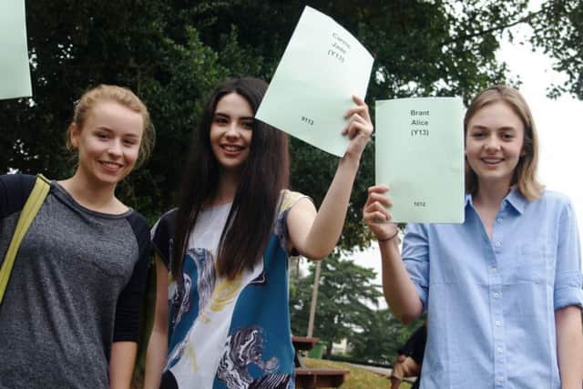 Martha Holt, Jade Carine and Alice Brant celebrating their results.