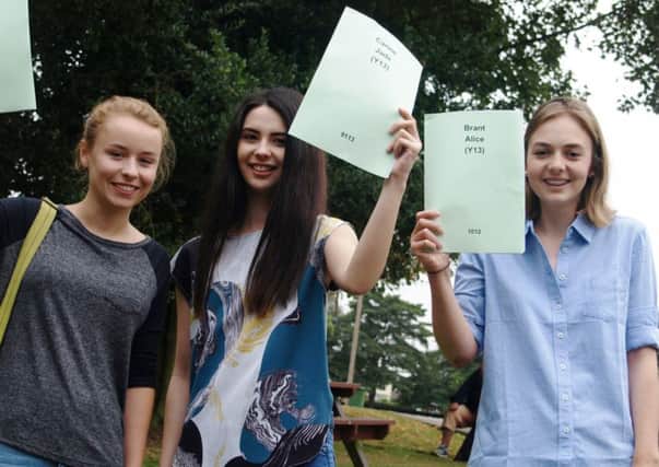 Martha Holt, Jade Carine and Alice Brant celebrating their results.