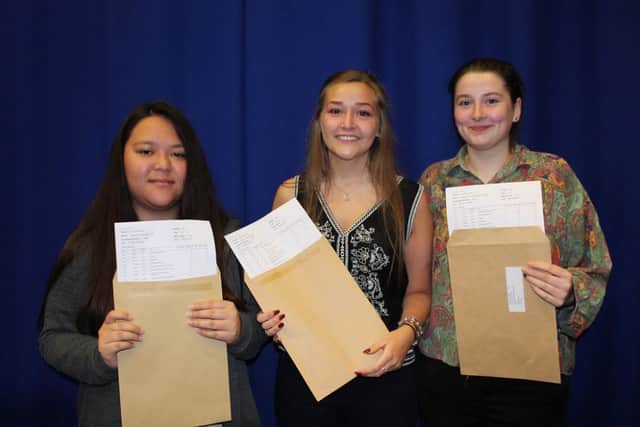 Jess Lee, Laura Barber and Poppy Torrington celebrate their A-Level results at Monks' Dyke Tennyson College, Louth.