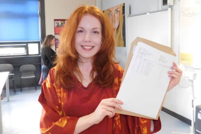 Ellie Milne of St George's Academy was surprised and excited to be heading to study English Literature at York University after gaining A* in geography, A in English and B in biology after changing her options halfway through the course having not initially choosing to go on to university. EMN-160818-120555001