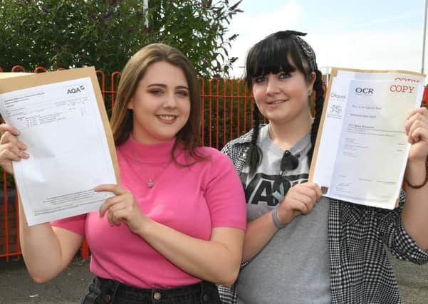 Students collecting their A-Level results Haven High Academy. L-R Demi Ward 18, Marissa Bent 18.