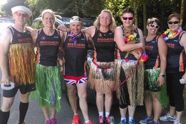 Running Club members wore hula outfits for their relay. NX5JiNXZOIltgHhZI56p