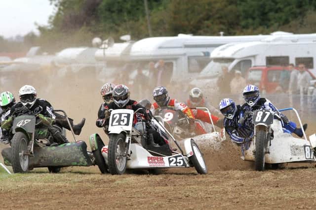 Colin Blackbourn in sidecar action.