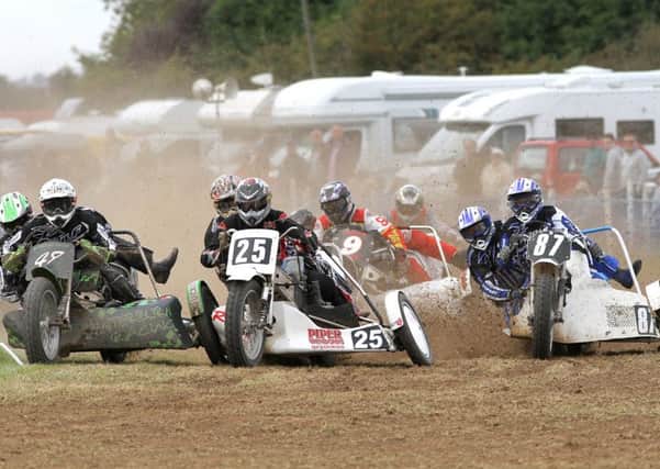 Colin Blackbourn in sidecar action.