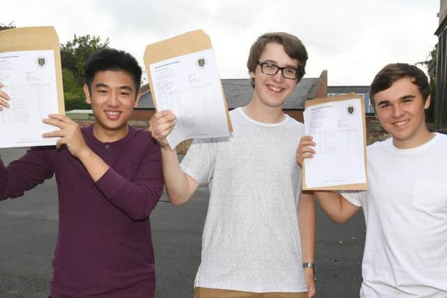 Students collecting their A-Level results at Boston Grammar School. L-R Jeremy Lee 18, James Burr 18, Joe Aisthorpe 18.