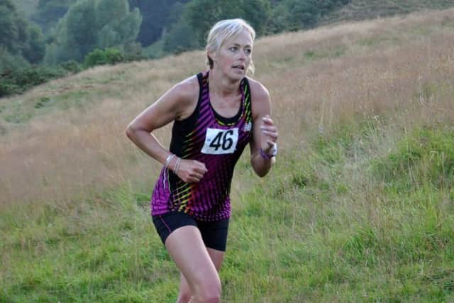 Janine Stones in action during the Stoney Middleton Fell Race EMN-160822-162607002