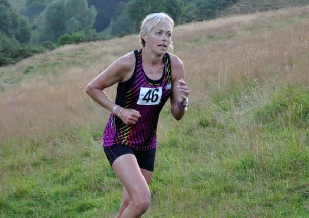 Janine Stones in action during the Stoney Middleton Fell Race EMN-160822-162607002