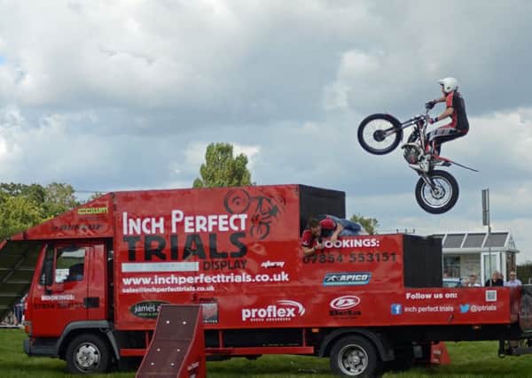 The Inch Perfect Trials motorcycle Display team gave daring acts of skills for the many visitors to sundays Wragby Show and Country Fayre. EMN-160829-141110001