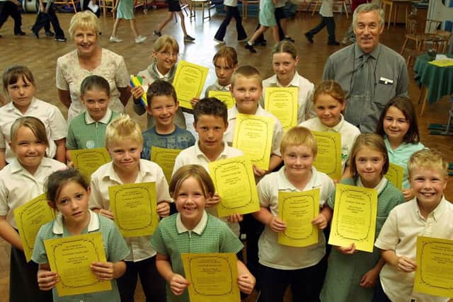 Skegness Seathorne School pupils received their end of term awards in July 2003 for hard work and effort as they prepared for the summer holidays.Three pupils from each class were picked for the top gold awards, which signify outstanding achievement and effort as judged by their class teachers. The awards were presented by Coun Pat Phillips who was a school governor and is pictured with headmaster Iain Cameron and the gold award pupils. EMN-160824-114827001