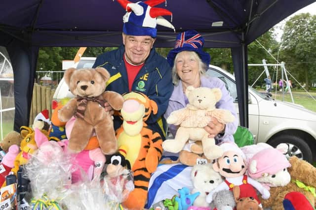 The family fun day with a teddy bears' picnic in Tower Gardens, Skegness. Gary Ellis, of East Coast Juniors U15's, with organiser Maggie Gray. ANL-160829-125319001