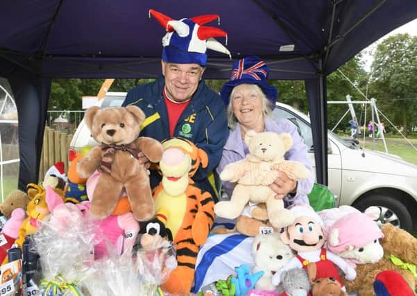 The family fun day with a teddy bears' picnic in Tower Gardens, Skegness. Gary Ellis, of East Coast Juniors U15's, with organiser Maggie Gray. ANL-160829-125319001
