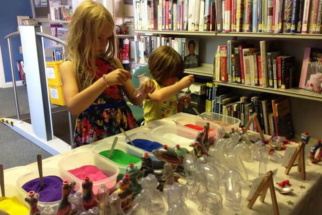 Beach-themed activity day at Donington Library. EMN-160822-094616001