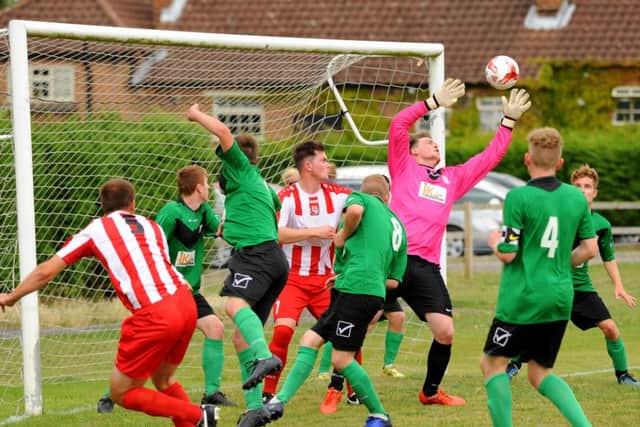 Action from Horncastle's 2-1 win over Brigg Town Reserves EMN-160822-112053002