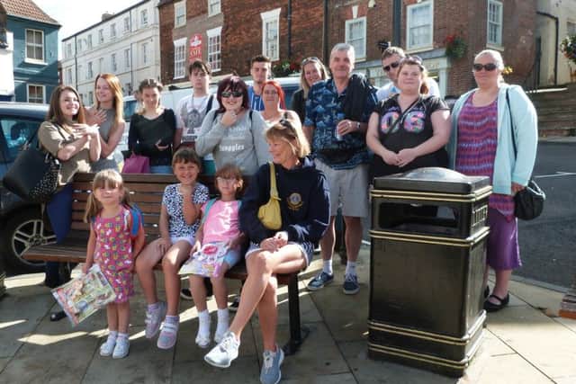 Some of the residents waiting to board the coach to Skegness. (Lin) EMN-160826-082449001