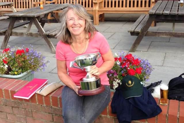 Market Rasen scorer Shelley Clayton with the trophy EMN-160824-173231002