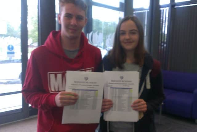Cameron Wilson and Nikkita Mason celebrating their GCSE results at Skegness Academy. ANL-160825-111538001