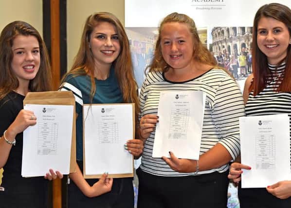 No Caption ABCDE












Fab four: This quartet at Barnes Wallis Academy were ready to celebrate their results, from left to right, Beth Pick, Sarah Dickson, Beth Appleyard and Niamh Bourke EMN-160825-124109001
