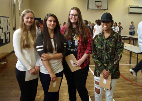 GCSE Results Day - 2016: Cordeaux Academy. Maisie Blades, Jessica Rocha, Tanieka Needham and Adele Tyson. EMN-160825-141352001