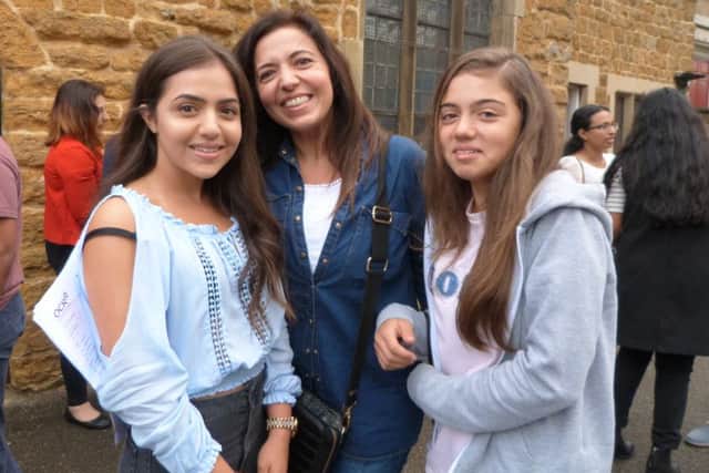 .Mum Aline Bazoua and sister Cindy celebrating Christel's excellent results of 8A* and 5As. (Lin) EMN-160825-142556001