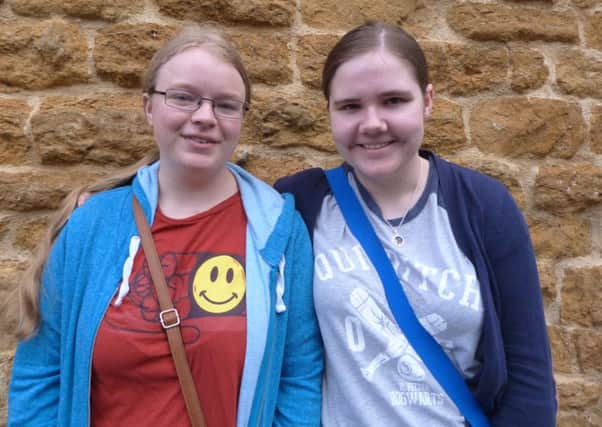 Lillian Coultas, left, (11A*s and1A) with Emily Jackson (2A*S, 7As, 2Bs). Both are staying at the school to do ALevels.  (Lin) EMN-160825-142735001