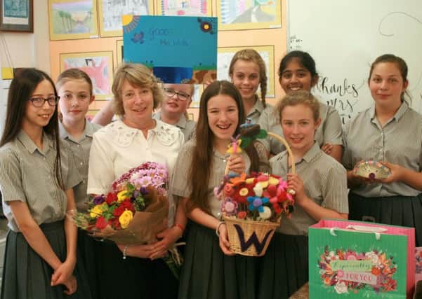 Long serving art teacher at Caistor Grammar School Ailsa Wish pictured with students in the art room on her last day. EMN-160831-143650001