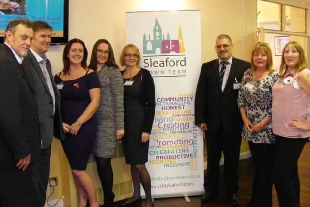 Happier times two years ago at the launch. The original eight committee members of Sleaford Town Team, from left - Eddie Jenkins, Andrew Rayner, Catherine Smith, Clare Rayner, Sharon Broadwood, Nigel Gresham, Karen Pole and Bev Jenkins. (Catherine Smith, Nigel Gresham and Sharon Broadwood are no longer members of the team. Photo: AH EMN-160829-144917001
