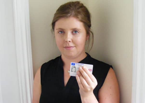 Georgia Burrows with her replacement licence. EMN-160209-123731001