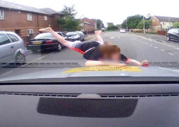 The shocking moment the boy ran out into the street captured on dash cam