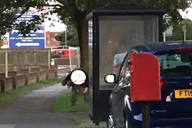Members of the public have been shocked by this image of a man relieving himself in a Skegness street. ANL-160831-130540001