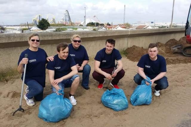 Volunteers at a beach clean in Ingoldmells. ANL-160831-150558001