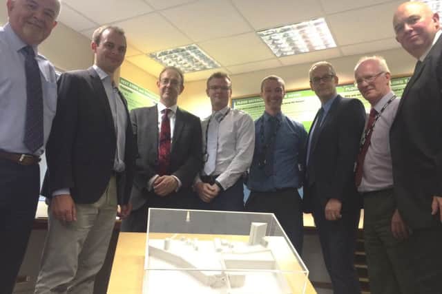 The chief executive of the Environment Agency Sir James Bevan (third from left) visited the Boston Barrier Community Hub. EMN-160831-163443001