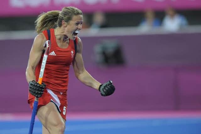 Great Britain's Crista Cullen celebrates scoring the 3rd goal against Belgium during the London 2012 Olympic hockey tournament, at the Riverbank Arena, Olympic Park, Stratford, East London, 2nd August 2012. EMN-160509-121359001