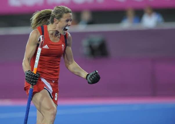 Great Britain's Crista Cullen celebrates scoring the 3rd goal against Belgium during the London 2012 Olympic hockey tournament, at the Riverbank Arena, Olympic Park, Stratford, East London, 2nd August 2012. EMN-160509-121359001